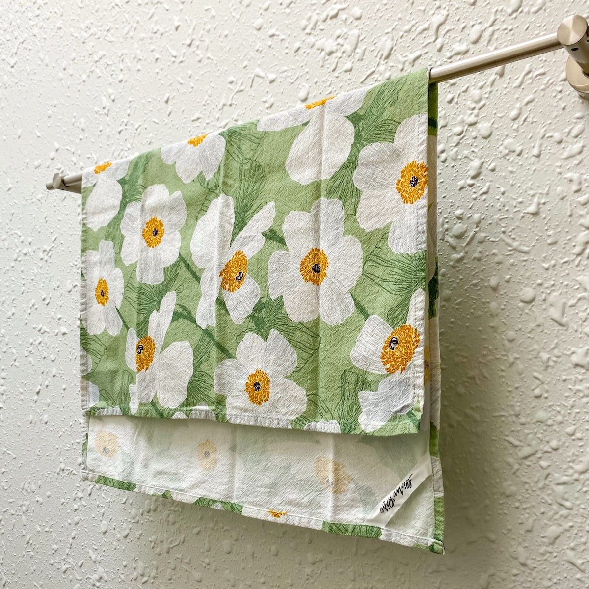 Hinu Rise: Pua Kala Flowers Tea Towel